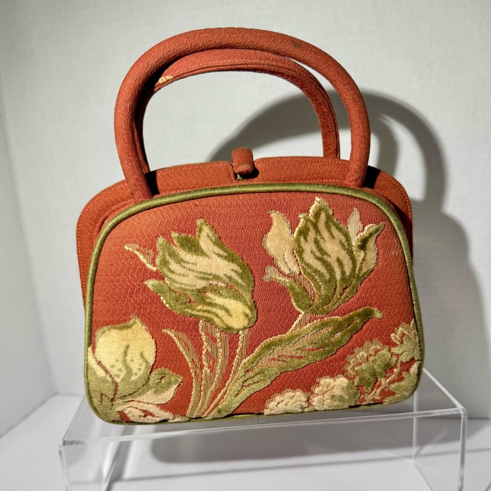 Nettie Rosenstein Handbag with coin purse and mirror.
1960’s.